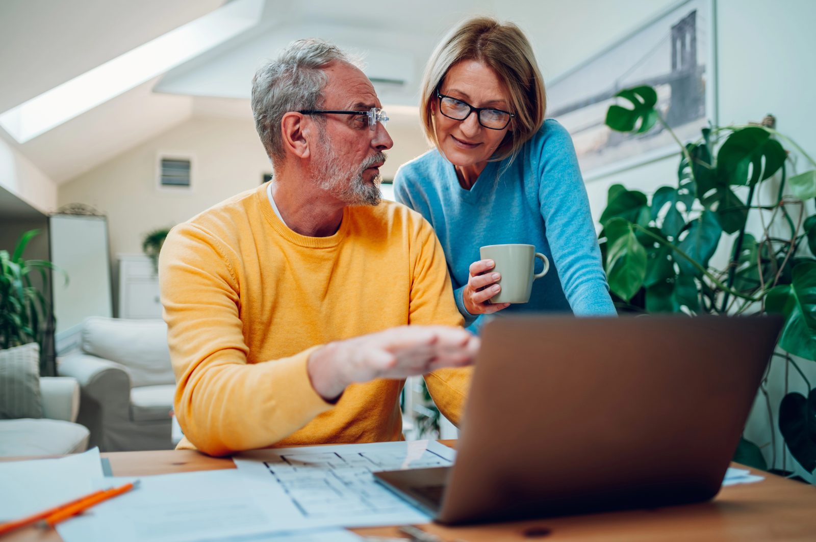 A couple reviewing their important documents together at home